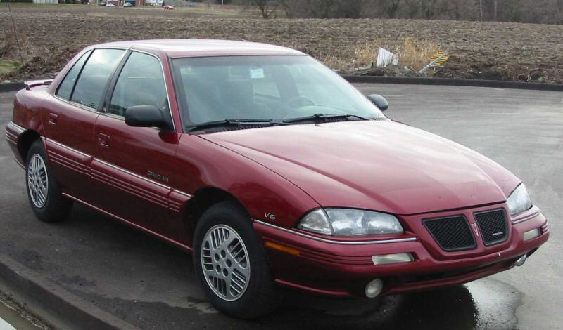 Illustration for article titled Ten Totally Bogus 90s Cars